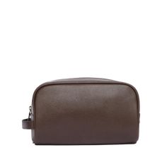 The Barbour Leather Washbag boasts rugged texture and charm thanks to its natural grained finish and rounded edges. A grab handle and external zipped pocket serve as practical additions, while an embossed logo badge to the front offers premium attention to detail. DETAILS Main outer: 100% leather Inner fabric: 100% polyester Wipe clean only Height: 14cm, Width: 24cm, Depth: 12.7cm Classic Brown Pouch For On-the-go, Classic Brown Pouch For Everyday, Classic Brown Everyday Pouch, Classic Solid Color Bag With Zipper Closure, Classic Textured Leather Travel Pouch, Brown On-the-go Pouch With Zipper Pocket, Textured Leather Travel Pouch, Rectangular Shape, Textured Leather Rectangular Travel Pouch, Rectangular Textured Leather Travel Pouch