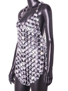 a mannequin wearing a bodysuit made out of crystal stones