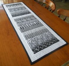 a table runner on top of a wooden table