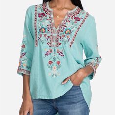 Nya Weekend Top Description Delicately Sewn Floral Details Blossom Across Our Nya Weekend Top To Create A Bouquet Of Stunning Spring-Perfect Designs. Small, Embroidered Details Trace Around The Sleeves And The Vibrantly Patterned Neckline. Dress It Up With Bold Statement Jewelry And Skinny Jeans Or Pair With Casual Joggers Or Shorts For A Chic, On-Trend Look. Product Details: Linen Model Height: 5'9" Measurements For Size Medium: Length- 26 1/2", Bust-42 1/5" Care Instructions: Machine Wash Cold Turquoise Floral Print Top For Spring, Light Blue Floral Embroidered V-neck Top, Bohemian Turquoise Top With Floral Print, Turquoise Bohemian Floral Print Top, Bohemian Turquoise Floral Print Top, Bohemian Light Blue Blouse With Floral Embroidery, Light Blue Bohemian Blouse With Floral Print, Turquoise Cotton Blouse, Bohemian Light Blue Floral Print Blouse