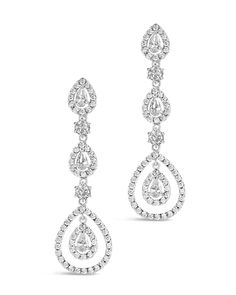 pair of diamond drop earrings on white background