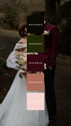 a couple standing next to each other in the woods with their wedding colors on them