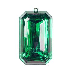 an emerald colored stone is shown on a white background with clippings to the side