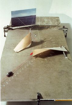 a skateboard ramp is shown on top of a concrete surface with various tools attached to it