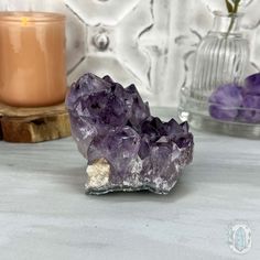 This mesmerizing Brazilian purple Amethyst is a true gemstone that boasts a rich violet hue accompanied by facets that sparkle in the light. The golden goethite inclusions within this gem create a unique, enchanting pattern. Approximate Size:L: 3.40" x W: 3.00" x H: 2.90"Approximate Weight:1.10 lbs. We make and carry many unique and one-of-a-kind items made of materials from around the world. Some may come with imperfections because they're natural. Appearances of cracks and chips aren't due to Faceted Amethyst Spiritual Gemstone, Purple Amethyst Gemstone Crystals, Lavender Amethyst Gemstone Crystals, Mystical Purple Gemstone Crystals, Purple Mystical Gemstone Crystals, Lavender Gemstone Crystals For Spiritual Use, Lavender Healing Gemstone Crystals, Large Purple Spiritual Stone Crystals, Spiritual Lavender Gemstone Crystals