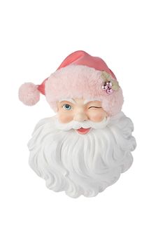 a close up of a santa claus head on a white background with a pink hat