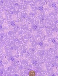 a purple background with swirls and a penny