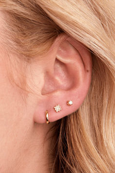 Elevate your ear stack with the Golden Trio Starburst Stud Earring Pack. Featuring a simple and timeless design, this set of hoop and stud earrings is perfect for a night out or dressed down with your favorite jeans and white tee. Ear Stacks, The Golden Trio, Earring Pack, Jewelry Staples, Golden Trio, Ear Stack, Dainty Studs, Jewelry Fashion Trends, White Tee