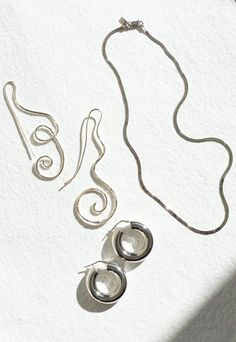 Essentialist Earring from Shannon Bond. Sterling silver hoop with hinge closure. Lightweight for everyday wear. Sold as pair. Need a second opinion? If you have special requests or just need advice, please reach out to hello@shop-vestige.com. Sterling silver. Made in Italy Minimalist Spiral Hand Forged Jewelry, Contemporary Everyday Jewelry With Ear Wire, Modern Silver Hoop Earrings With Sterling Clasp, Minimalist Sterling Silver Clasp Earrings, Minimalist Spiral Silver Jewelry, Contemporary Silver Hoop Earrings For Everyday, Minimalist Small Hoop Jewelry With Sterling Silver Clasp, Contemporary Small Hoop Jewelry For Everyday, Contemporary Sterling Silver Jewelry