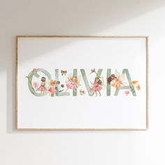 the word glyvia is made up of flowers and fairy figurines in pastel colors