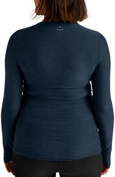 Strike your best pose in this easy-moving top designed with comfortable stretch. 26 1/2" length (size Medium) Crewneck Long sleeves with thumbhole cuffs 94% polyester, 6% spandex Machine wash, tumble dry Made in the USA of imported fabric Versatile Soft Stretch Long Sleeve Top, Versatile Long Sleeve Top With Soft Stretch, Fall Yoga Tops With Crew Neck, Fall Yoga Crew Neck Tops, Versatile Stretch Long Sleeve Top With Thumbholes, Workout Tops With Thumbholes And 4-way Stretch, Stretch Long Sleeve Top With Thumbholes For Layering, Versatile Yoga Tops With Thumbholes, Stretch Tops For Yoga In Fall