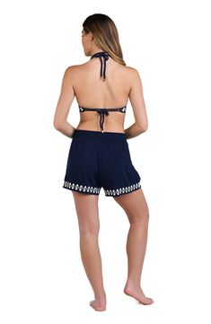 This stunning collection, embellished with intricate soutache embroidery, showcases a white design reminiscent of delicate sea scallop shells. These beach shorts feature an elasticized waist with a drawstring tie tipped with tassels offering a comfortable, adjustable fit, while pockets provide the perfect place to tuck in a room key or lip balm. [split] Details Beach shorts 3 1/2" inseam Side pockets Elasticized drawstring waist Indigo tassels Fabric 100% Rayon Sea Scallops, White Sea, Scallop Shells, Beach Shorts, White Design, White Patterns, The Balm, Fabric