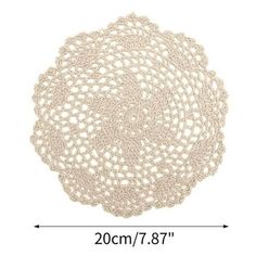 an image of a white doily with measurements for the top and bottom half of it