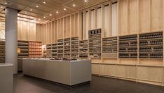 an empty room with shelves filled with bottles