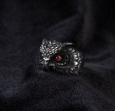 * Owl head ring , Owl gifts , Owl ring , Best gift for men , Animal ring  * Product Weight: Approximately 8 grams ( May differ due to sizing and handmade structure) ( 1 ounce = 28.5 grams ) * Preparation Time usually 1-3 days. All rings are designed and hand crafted by us. SIZING * All sizes are available since we hand craft each ring individually. We provide you size conversion charts for different measurement systems on the pictures. You may easily measure and determine your size OR anytime please MESSAGE to us for help about finding your size. SHIPPING * Express shipping USA, Canada and EU and UK with FEDEX , UPS, DHL and TNT. However due to increased costs of shipping in order to provide you best possible prices in the market we use economy shippings for other countries. Please check e Eyes Ring, Silver Rings For Men, Grand Bazaar Istanbul, Owl Head, Main 1, Owl Ring, Owl Eyes, Animal Ring, Owl Gifts