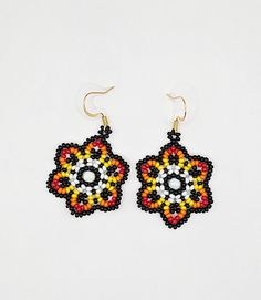 Handmade beaded earrings flower design ✨️ Summer Flower Shaped Beaded Earrings With Dangling Beads, Summer Flower Earrings With Dangling Beads, Black Flower Jewelry For Summer, Beaded Flower Earrings For Summer, Summer Beaded Dangle Flower Earrings, Black Beaded Earrings For Summer, Beaded Flower Drop Earrings For Festival, Summer Black Beaded Earrings, Summer Flower-shaped Beaded Jewelry