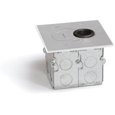 a square metal object with holes in the center and two circles on it's sides