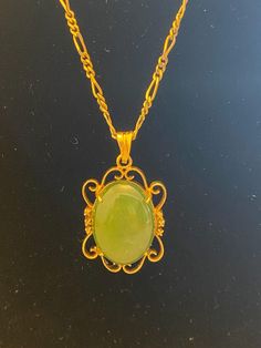 Absolutely gorgeous natural jade pendant Victorian necklace in gold tone chain. The gemstone is an oval cabochon. It is 1.5" long x .9" wide. The chain is 18 inches long. In excellent vintage condition. - Please note, most of my store's items are vintage or pre-owned. Most items are in very good/good vintage pre-owned condition. - Thank you so much for shopping with me and please check out my other jewelry listings, I post new items daily! Oval Jade Cabochon Necklaces, Oval Jade Cabochon Necklace, Jade Cabochon Oval Pendant Necklace, Oval Jade Gold Necklace, Vintage Oval Jade Necklace, Antique Green Oval Pendant Necklace, Vintage Green Oval Necklace, Jade Necklace Pendant, Jade Pendant Necklace