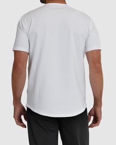 Introducing Ghost Golf's Men's Lifestyle Collection t-shirt. Crafted with premium cotton fibers, it offers structured durability and a crisp, clean drape. Enjoy features like shrink-resistance, fade-resistance, and breathability, along with unrestricted movement thanks to ultra-stretch fabric. With a contemporary drop cut bottom, this tee effortlessly transitions from the office to evenings out, making it the ultimate essential for the modern golfers. Fit: Classic Fit. Fabric: 70% Cotton, 25% Po Ghost Tee, Golf Shop, Mens Golf, Mens Lifestyle, Modern Gentleman, Golf Outfit, Mens Tees, Black Tee, Stretch Fabric