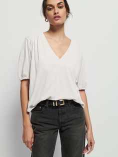 Not your boyfriend's v-neck. Shirred cuffs and front and back yoke give it that relaxed vibe, with a subtle balloon sleeve for a feminine twist. (This one comes in Porcelain). | Edie Top in Porcelain | Ethical Essentials Shoulder Top, Porcelain, Twist, Relaxed Fit, V Neck, T Shirt, Color