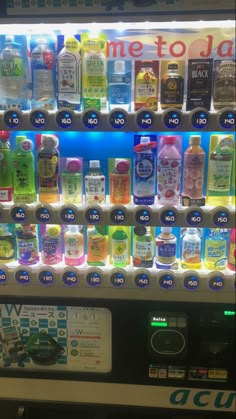 a vending machine filled with lots of different types of drinks on it's sides