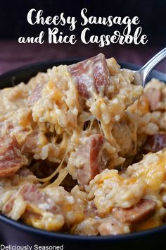 cheesy sausage and rice casserole in a black bowl