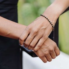 Simple and stunning black and gold beads encompass this bracelet, great for most looks and day or night. This minimalist bracelet looks great when stacked or worn solo. Pair it with our halo bracelets or Vivid necklace for a complete look. Made with love in our India Sanctuary, this ethically handmade bracelet supports young women escaping human trafficking in India, Uganda, and the Philippines. Each artisan receives fair wages, education, health care and community through our non-profit, Intern Elegant Black Bracelets For Everyday, Minimalist Black Adjustable Beaded Bracelets, Minimalist Stretch Bracelet With Round Beads For Everyday, Minimalist Stretch Bracelet With Round Beads, Minimalist Hand-strung Stretch Bracelet For Everyday, Minimalist Everyday Stretch Bracelet With Round Beads, Minimalist Black Beads Bracelet For Gift, Minimalist Black Beads Bracelet As Gift, Minimalist Black Beads Bracelets As Gift