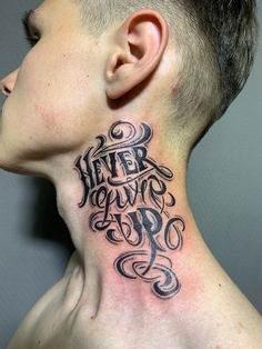 a man with a tattoo on his neck that says never you've got up