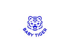 the baby tiger logo is blue and has an animal's head on it,