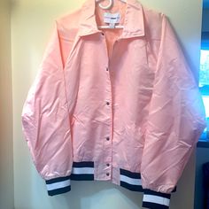 Men’s Light Spring Jacket Light Pink Brand New Never Worn Fashion Nova Men’s Brand Size Medium Pls Read Description Before Buying All Item All Item Finals And Not Nonrefundable If You Have Any Question Just Ask Before Purchasing The Item) Spring Varsity Jacket With Button Closure, Sporty Collared Outerwear With Pockets, Casual Spring Collared Track Jacket, Spring Windbreaker With Ribbed Cuffs, Spring Workwear Windbreaker With Ribbed Cuffs, Spring Casual Button-up Windbreaker, Casual Spring Button-up Windbreaker, Retro Spring Outerwear With Ribbed Cuffs, Fashion Nova Men