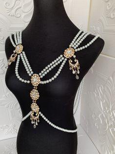 Gold and white Glamorous Crystal Body Chain For Wedding, Elegant Crystal Jewelry With Gold Beads, Glamorous Beaded Wedding Necklaces, Opulent Jeweled Necklaces For Wedding, Opulent Jeweled Wedding Necklaces, Glamorous Beaded Wedding Necklace, Gold Long Bridal Necklace For Wedding, Bohemian Wedding Necklace With Jewels, Gold Beaded Rhinestone Necklace For Wedding