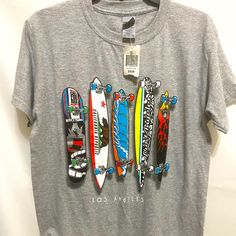 Boys Skateboard Tshirt New Size 7 Graffiti Print T-shirt For Skateboarding, Casual Skateboarding Top With Front Print, Casual Tops With Front Print For Skateboarding, Casual Front Print Tops For Skateboarding, Graphic Tee With Front Print For Skateboarding, Graphic Tee T-shirt With Front Print For Skateboarding, Casual Graphic Print Tops For Skateboarding, Summer Letter Print T-shirt For Skateboarding, Graphic Tee T-shirt With Graffiti Print For Skateboarding