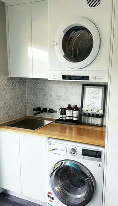 a washer and dryer in a small kitchen