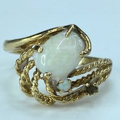 A Lady 14k Yellow Gold Ring, Two Opal Cabochon Prong Set On Top, One Oval Shape 8.6 X 6.5mm, One Round Is 2.0mm. Rope Link Wired Decorated On Top. 13.0mm Wide, Ring Size 6.5, Weight 2.8g, Tested 14k Yellow Topaz Ring, Link Ring, Wide Ring, Linking Rings, Yellow Gold Ring, A Lady, Topaz Ring, Womens Jewelry Rings, Yellow Gold Rings