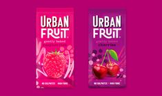 two bags of urban fruit are shown on a bright pink background, one is filled with raspberries and the other has an apple