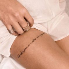 a woman's leg with a tattoo that says, what does she do?