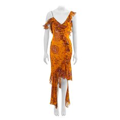 ▪ John Galliano evening dress ▪ Spring-Summer 2003 ▪ Crafted from silk chiffon in a vibrant saffron hue, featuring a batik-dyed outsized paisley print ▪ The neckline, shoulder straps, and bodice are adorned with a delicate ruffled trim ▪ Boasting a flounced, asymmetric high-low skirt ▪ Designed with a v-neck and low back ▪ Lined with matching silk chiffon ▪ FR38 - UK10 - US4/6 ▪ Made in France The photographs presented in this listing, with the exception of any reference or runway imagery, requi Chic Spring Dresses, Summer Silk Dress With Paisley Print, Yellow Bohemian Evening Dress, Bohemian Yellow Evening Dresses, 00s Style, Silk Evening Dress, Silk Print Dress, Different Dresses, Dress Spring