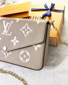 Condition: New - 8.3 x 4.7 x 1.2 inches (length x Height x Width)- Tourterelle Gray/Cream- Monogram Empreinte embossed supple grained cowhide leather- Textile lining- Gold-color hardware- Press-stud closure- Large compartment- Inside flat pocket- Chain:Removable- Chain drop: 20.9 inches- Made in Italy - Retail: $1760 plus tax- No inserts- Comes with: original box, dust bag and receipt Shipping: All orders will be shipped the following business day Felicie Pochette, Louis Vuitton Felicie Pochette, Louis Vuitton Felicie, Balenciaga Backpack, Louis Vuitton Purse, Lv Handbags, Bags Designer Fashion, Lv Bag, Burberry Bag