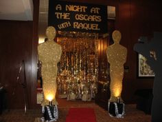 the entrance to an oscars party with decorations