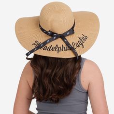 Saddle up for surf, sand, and sun with this Philadelphia Eagles Women's Wordmark Beach Straw Hat! Features Sturdy straw construction that makes this a perfect fit for your summer style Embroidered team logo display, in case there were any doubts where your allegiances lie Embroidered, team-colored script wordmark team name display on back brim for a little extra fan flair Team-colored tie band with repeat team logo display around crown for even more team spirit Details Material: Artificial Straw Beach Season Straw Hat, Adjustable Straw Hat For Poolside Beachwear, Casual Adjustable Straw Hat For Poolside, Adjustable Straw Hat For Beach Season Sunbathing, Adjustable Straw Hat For Sunbathing At Beach, One Size Fits Most Sun Hat For Beach Season, Adjustable Straw Hat For Pool And Beach Season, Adjustable Straw Hat For Beach Season And Pool, Adjustable Straw Hat For Beachwear