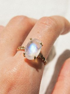 This piece is part of the Rêves Collection. Moonstone is the birthstone of June! Gemstone(s): Rainbow Moonstone Ring size: US 5.75 Metal material: 14K gold fill This item will be ready to ship in 1 - 3 business days. Engagement Ring Moonstone, June Gemstone, Circle Charm Necklace, Silver Promise Rings, Peridot Color, Alternative Engagement Ring, Ring Moonstone, Green Amethyst Ring, Rainbow Moonstone Ring