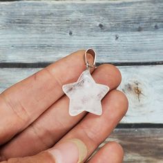 "Clear and white quartz star charm pendant with choice of chain length. You will receive one pendant similar to the photos. Size: 20mm weight: 3-4g each Locality: China Quartz is composed of silicon and Oxygen. Quarts is one of the most abundant minerals in the earth's crust. The name quartz is derived from the German word \"Quarz\" possibly meaning \"Hard\" . Quartz is also called \"Rock Crystal\" or \"Ice Crystal\" from the Greek word \"Krystallos\" meaning \"Ice\" Quartz is associated with th Silver Star Charm Crystal Necklace, Silver Crystal Necklace With Star Charm, German Word, Quartz Crystal Jewelry, Star Crystal, Star Charm Necklace, Amethyst Healing, Crystal Stars, Crystal Drop Earrings