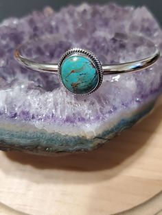 * 13.5 Grams Turquoise Bracelet cuff *Free Shipping *components are solid .925 silver.  * Cuff 6  inches long end to end , opening gap is 1 1/4 inches adjustable * Fit wrist 6 1/4 to 7 Thank You For Your Looking ,And Check Out More Items In My Etsy Shop For More Great Deals, Also We Add More Jewelry To Etsy Shop Regularly  https://www.etsy.com/shop/ABQdesign. Please review items carefully before purchasing. I accept returns within 7 days of receiving the item. Buyer is responsible for return shi Bohemian Turquoise Sterling Silver Cuff Bracelet, Southwestern Style Turquoise Bangle As A Gift, Southwestern Style Round Turquoise Cuff Bracelet, Southwestern Style Turquoise Cuff Bracelet, Southwestern Turquoise Bangle, Bohemian Turquoise Round Cuff Bracelet, Bohemian Turquoise Cuff Bracelet, Bohemian Style Turquoise Round Cuff Bracelet, Turquoise Bracelet Cuff