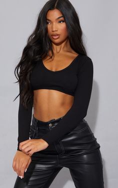 A crop top is Basic this season and this style is number one on our hitlist doll. Featuring a Black Cotton Blend material with long sleeves and a deep V design, what's not to love Team with your fave pair of comfy bottoms and statement accessories for a look we are obsessing over. Length approx 33cm/13 (Based on a sample size UK 8)   Model wears size UK 8/ EU 36/ AUS 8/ US 4 Model Height - 5ft 9 Plt Outfits, Comfy Bottoms, V Design, Black Long Sleeve Crop Top, Ibiza Outfits, Statement Accessories, Crop Top Outfits, Denim Accessories, Student Fashion