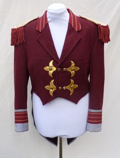 "Mens Medium , Upcycled red ringmaster , greatest showman tailcoat . Would fit a women size UK 20 ,US 16 Made from a mens ' Debenhams  ' red woollen jacket. It also has gold applique  and gold buttons.  Measures chest 116 cm (45.5 \") Waist 106 cm (41.5 \") shoulder to hem front 51.5 cm full length back 101 cm sleeve length 63 cm top sleeve width 21.5 cm shoulder seam 17.5 cm across front 43.5 cm (across back 49 cm ) all the way around armhole 56.5 cm  Can post quickly if needed by a certain dat Red Fitted Blazer For Costume Party, Fitted Red Ceremonial Outerwear, Fitted Red Outerwear For Ceremonial Occasions, Matilda Costume, Circus Fashion, Bespoke Jacket, Steampunk Festival, Gold Applique, Pinstripe Suit