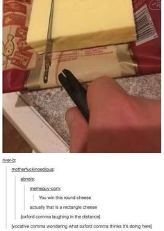 a person is holding a pen in front of some cheese