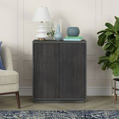 Keep your home office, family room, or bedroom organized without sacrificing style. This sturdy and compact accent cabinet is designed to give you a flexible storage option wherever you need it, whether its for office supplies, closet overflow, or just the various knick-knacks and doo-dads that dont have a space of their own. Featuring an adjustable center shelf, this versatile cabinet can even help you organize printers, game consoles, or charging stations. The wood-grained finish adds warmth a Color Console Small Table Dark Gray, Foyer Cabinet, Contemporary Industrial Mini Coffee Cabinet Cart Luxury 36" Wide, 36" Navy Blue Entry Cabinet . Narrow, Accent Cabinet 36”, Short Cabinet 24”wide X32” High, Accent Cabinet, Organization Bedroom, Knick Knacks