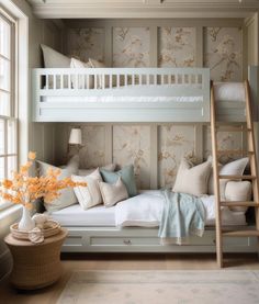 a white bunk bed sitting in a bedroom next to a window with flowers on it