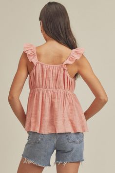 Live, laugh, love in the boho chic Trixie Top with a sweetheart neckline and ruffles shoulders for a true boho look. Fabric Contents: 100% Cotton, Non-sheer fabric Size Measurement (inch): S: 20.0 (Bust), 19.0 (Waist), 20.0 (Hips), 20.0 (Length) M: (Bust), (Waist), (Hips), (Length) L: (Bust), (Waist), (Hips), (Length) Size Measurement (inch): S: 20.0 (Bust), 19.0 (Waist), 20.0 (Hips), 20.0 (Length) M: (Bust), (Waist), (Hips), (Length) L: (Bust), (Waist), (Hips), (Length) Bohemian Pink Top With Smocked Back, Bohemian Pink Tops With Ruffles, Pink Tops With Smocked Back And Ruffled Straps, Pink Ruffled Straps Top For Brunch, Pink Bohemian Flutter Sleeve Tops, Bohemian Pink Top With Flutter Sleeves, Bohemian Pink Tops With Flutter Sleeves, Look Boho Chic, Plus Jumpsuit