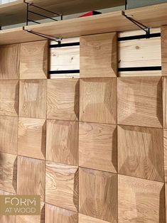 the wood paneled wall has been made from several different types of boards